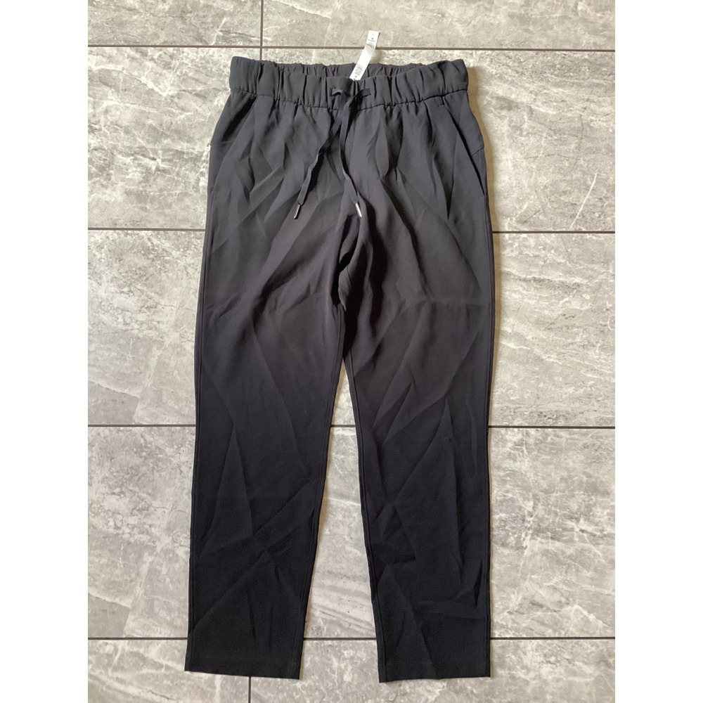 Lululemon On the Fly 7/8 Pant Black W5AUJS Size 6 Drawstring Jogger Trouser